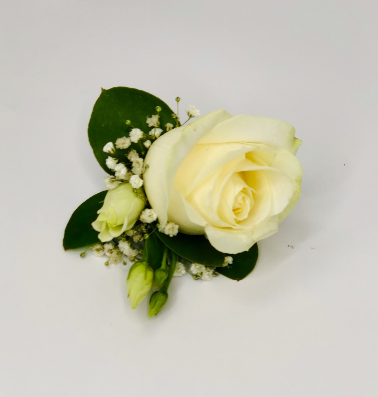 Simple White Rose and Lisianthus Ladies Buttonhole