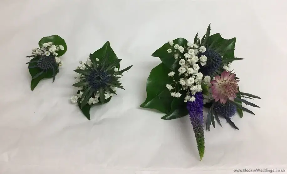 Blue and purple rustic country style wedding party buttonholes