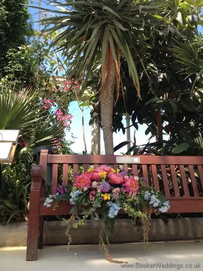Bright and colourful wild just picked country garden Top Table flowers at The Palm House, Sefton