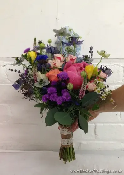Rustic country style Bridesmaid bouquet with Asters, Freesias, Peonies, Delphinium, Nigela, Stocks, Cornflowers, Spray Roses, Veronica, Lavender Side View