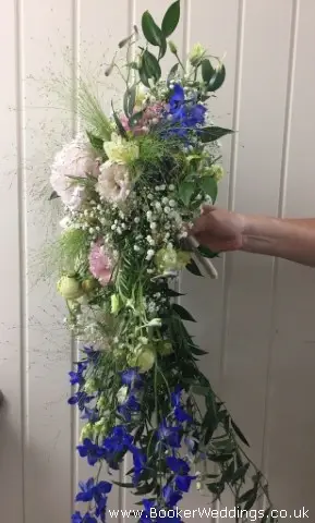 Bride Shower Bouquet Of Wild Flowers In Pink And Blue Side View