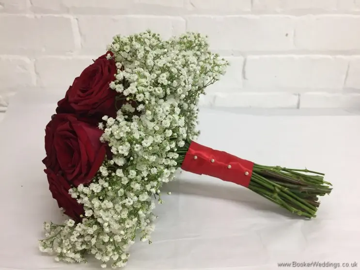 Hand tied Bridal bouquet with red roses and a gypsophila collar_side view