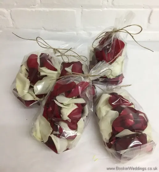 Red and white rose petals for flowergirls to scatter