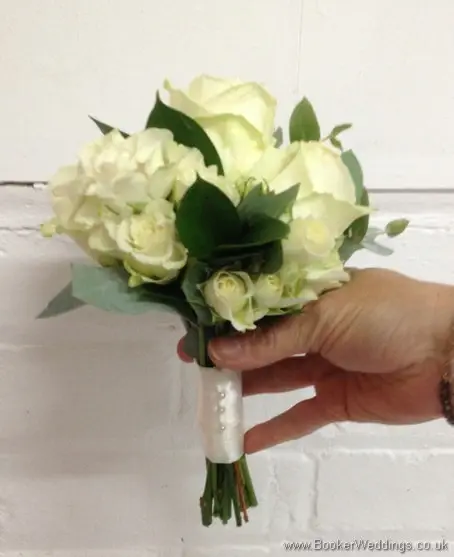 White rose and spray rose flowergirl bouquet side view