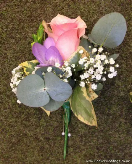 Pink Rose, Lilac Freesia and Gypsophila Grooms Buttonhole