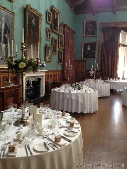 Tall Table Centrepieces at Knowsley Hall of Spring Mix Flowers - Pinks Purples and Blues with Ivory rose, purple tulips, blue hyacinth, gypsophila