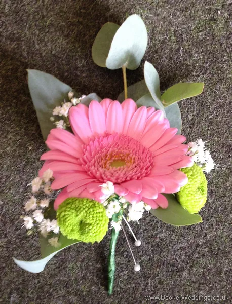Pink gerbera and gypsophila grooms buttonhole