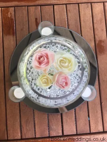 Fishbowls on Mirror Plates with Roses and Candles
