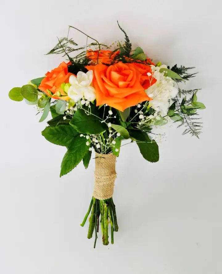 Bridesmaid Handtied Of Orange Roses and White Freesia