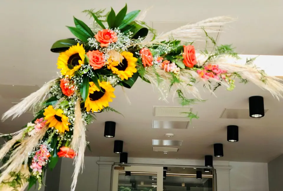 Summer Flower Arrangement On Wedding Moongate