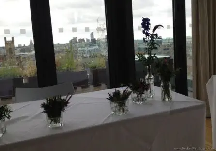 English Garden Flowers Just Picked Look in Jam Jars for Top Table Decoration - opposite end at The Hope Street Hotel, Liverpool