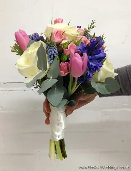 Pink, Blue & Cream Semi Wild Bridesmaid Hand Tied Bouquet with Cream Roses, Pink Spray Roses, Pink Tulips, Wax Flowers, Blue Muscari and Hyacinth Side View