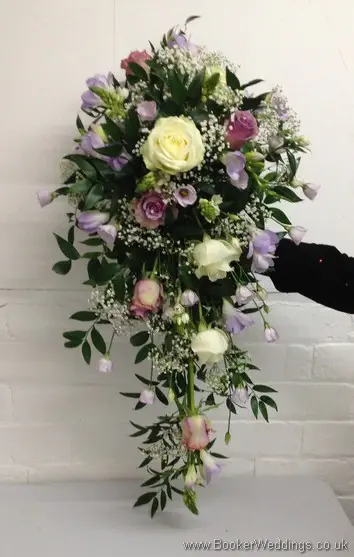 Lilac and Cream Roses with Lilac Lissianthus, Lilac Freesia and Gypsophila Hand Tied Bridal Shower Bouquet Front View