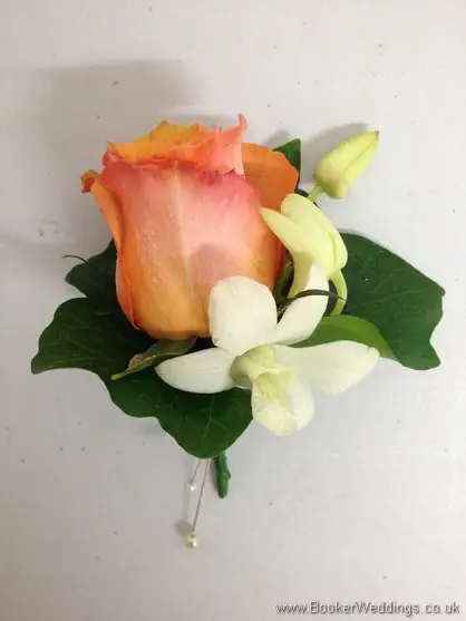 Orange Rose and Dendrobium Orchid Grooms Buttonhole