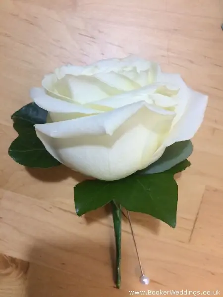 classic white rose buttonhole for wedding party