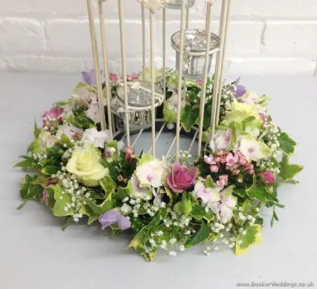 Bird cage table centerpieces, Pastel flowers of Peony, Rose, Hydrangea and Freesia Close Up