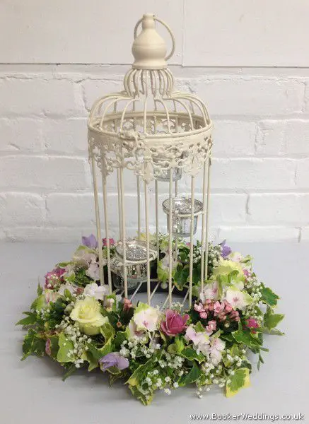 Bird cage table centerpieces, Pastel flowers of Peony, Rose, Hydrangea and Freesia
