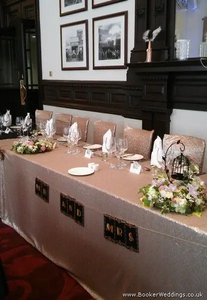 Top Table with Bird cage table centerpieces, Pastel flowers of Peony, Rose, Hydrangea and Freesia at the Doubletree Hilton, Liverpool