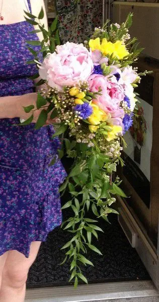 Brides multi coloured country garden shower bouquet - side