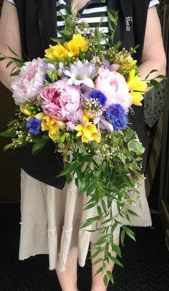 Brides multi coloured country garden shower bouquet