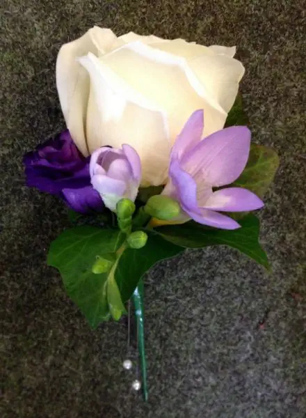Cream Rose Freesia and Lissianthus Buttohole