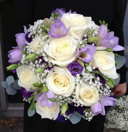Cream and Purple Rose Freesia and Lissanthus Brides Bouquet