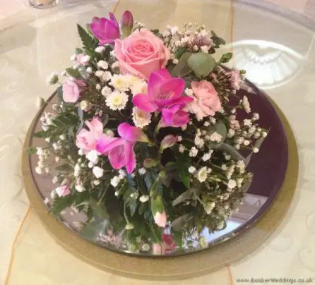 Pink and White Arrangement on a mirror for the centre of the reception table