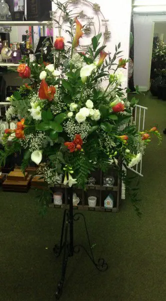 White and Mango Rose and Calla Lilly Pedestal Arrangement