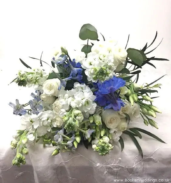 Bride Just Picked Wild Flowers Bouquet of Blue Delphinium Stocks Lissianthus White Spray Roses