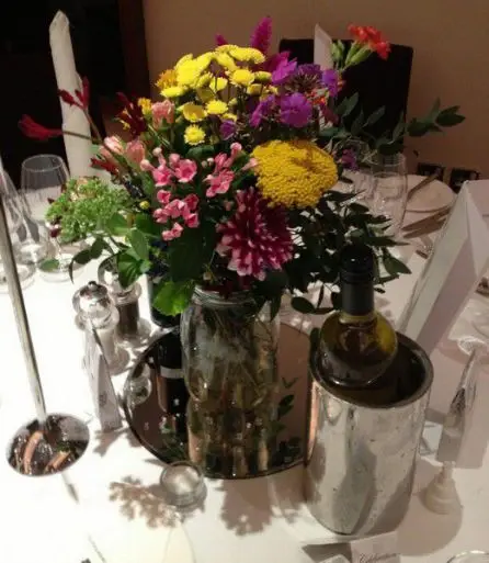 Multicoloured Mason Jar Table Arrangement