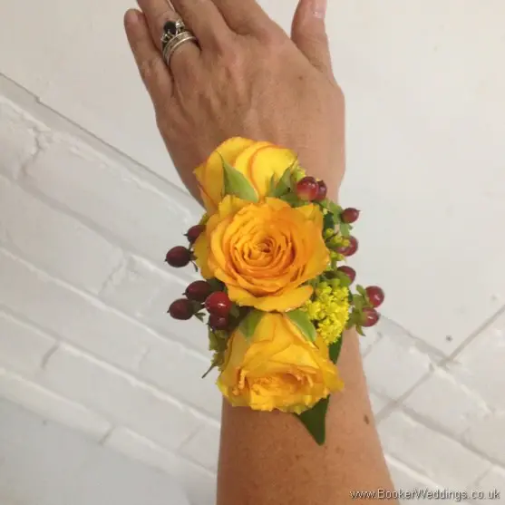 Autumnal Coloured Wrist Corsage with Gold Roses, Yellow Solidaster and Red Hypernicum Berries