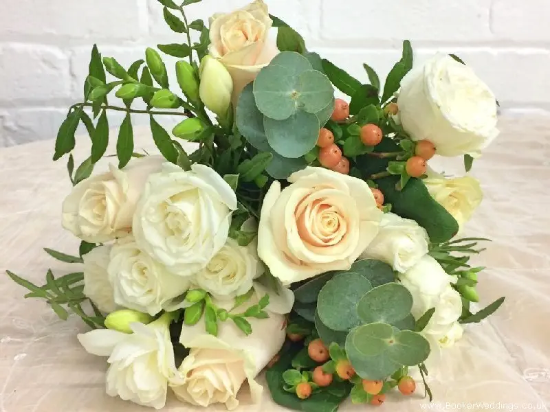 Bride HandTied Bouquet of Peach Roses White Spray Roses White Freesia and Hypericum Berries