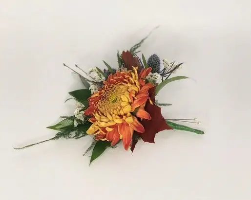 Orange and Blue Boutonniere for Autumn Wedding