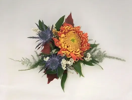 Orange and Blue Chrysanthemum Boutonniere for Groom