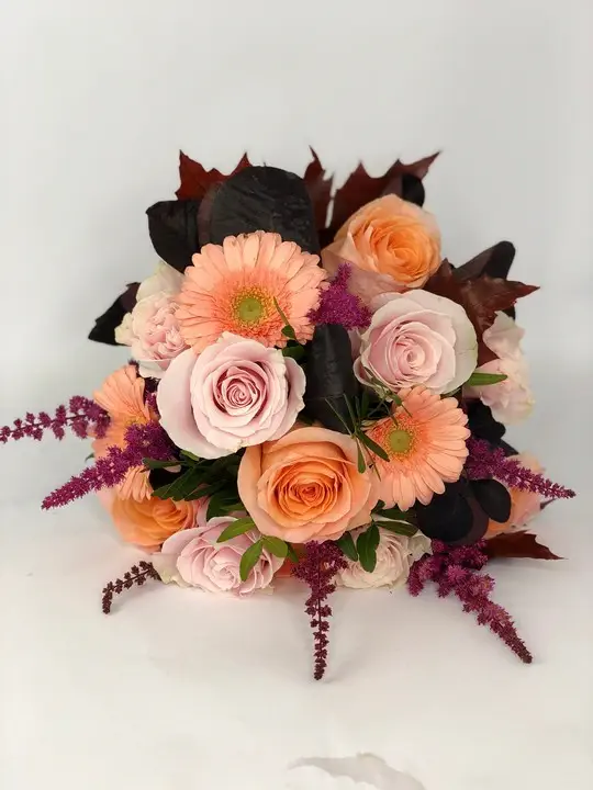 Peach Rose Bridal Bouquet with Deep Foliage