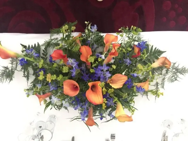 Top Table Arrangement In Orange And Blue