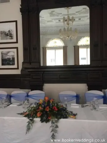 Top Table Flowers For Orange And Blue Wedding