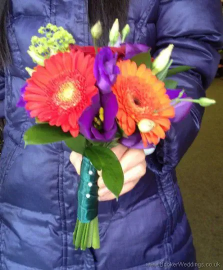 Bright and Vibrant Rose, Gerbera and Lissianthus Flowergirl Bouquet Side View