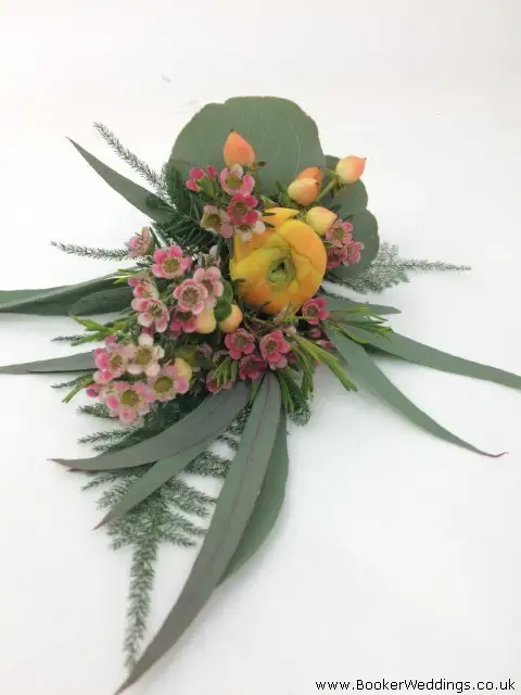 Groom Buttonhole Hypericum Ranunculus and Wax