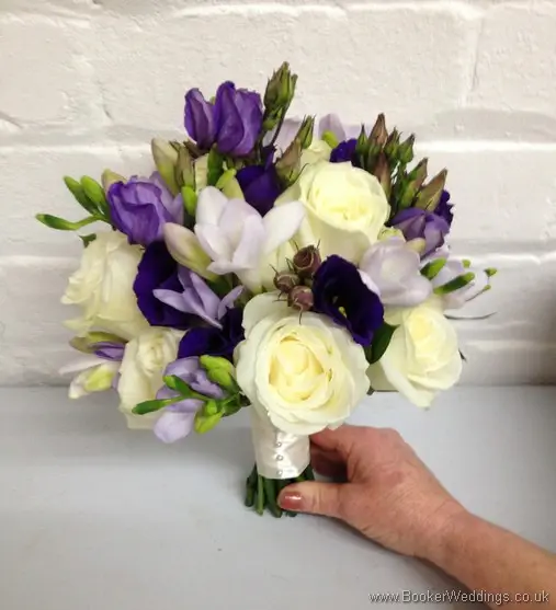 Purple and Cream Wedding Flowers - Brides Bouquet with Lilac Freesia, Purple Lissianthus and Ivory Rose in a hand tied Bouquet Side View