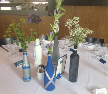 Blue and White Bottle Table Centres Arrangment Wedding Flowers