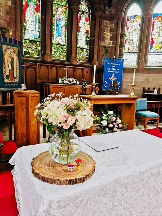 White Hydrangea and Pink Rose Vase on Registrar Table