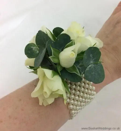 Ivory spray rose wrist corsage with pearl bracelet