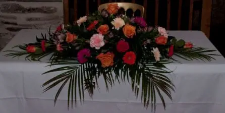 Top table Arrangement of Rose, Germini and Carnations