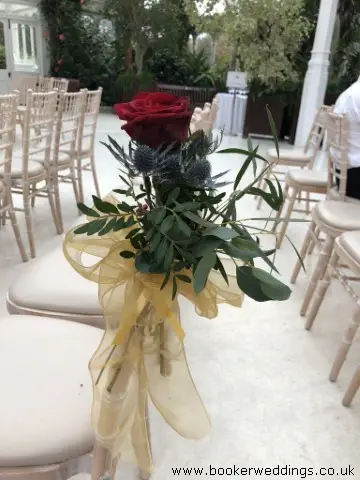 Pew Ends of Red Roses and Eryngium