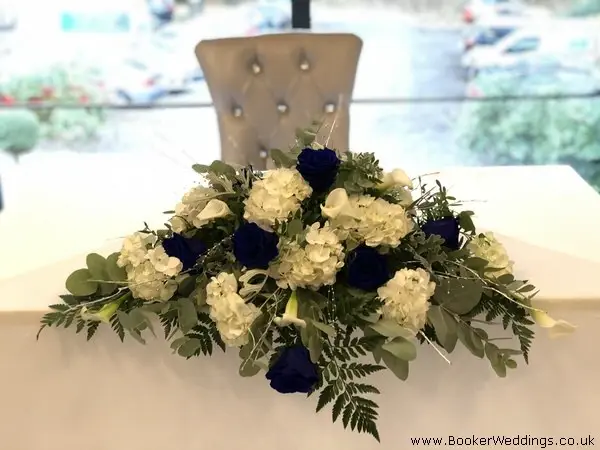 Blue Roses White Hydrangea White Calla Lily Silver Foliage Arrangement