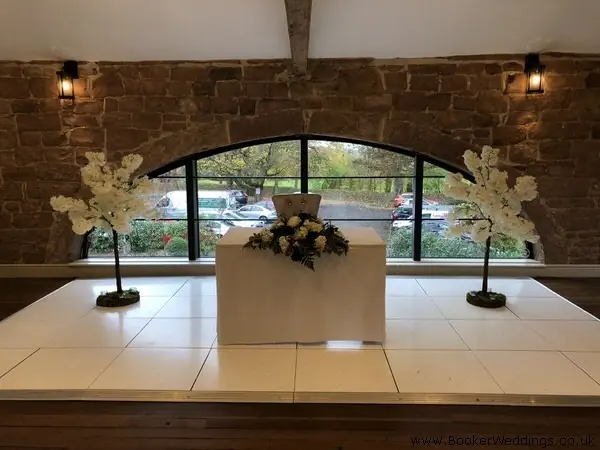 Blue and White Top Table and Blossom Trees Allertron Manor